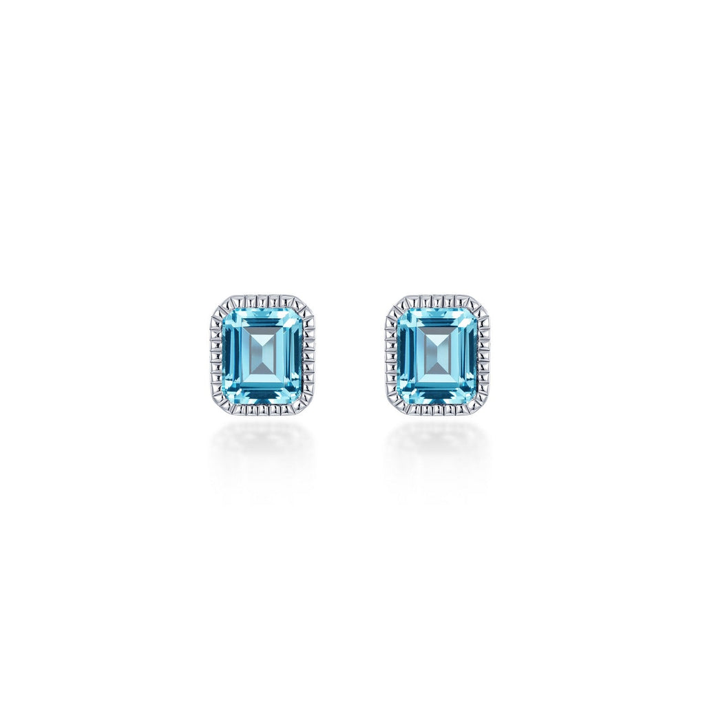 Emerald-cut aquamarine silver stud earrings.