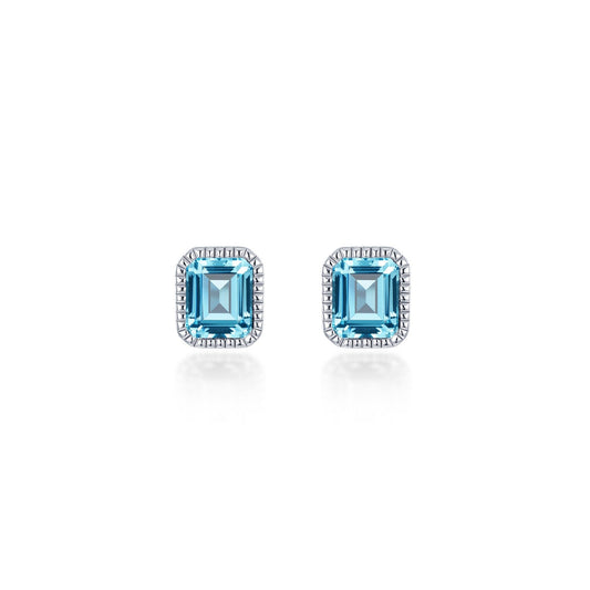 Emerald-cut aquamarine silver stud earrings.
