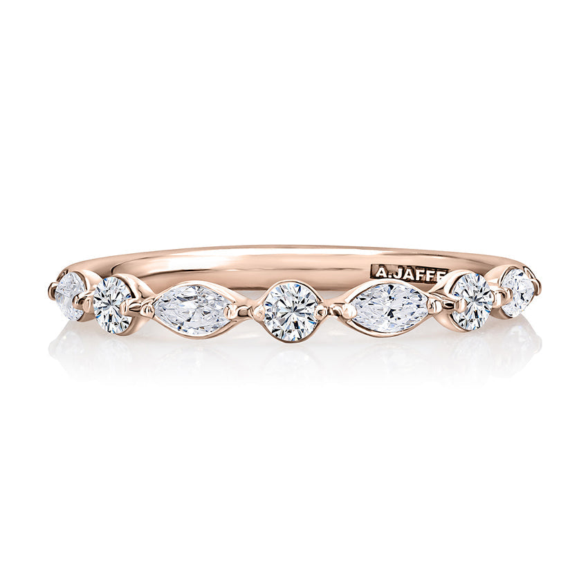 Rose gold band with marquise diamonds.