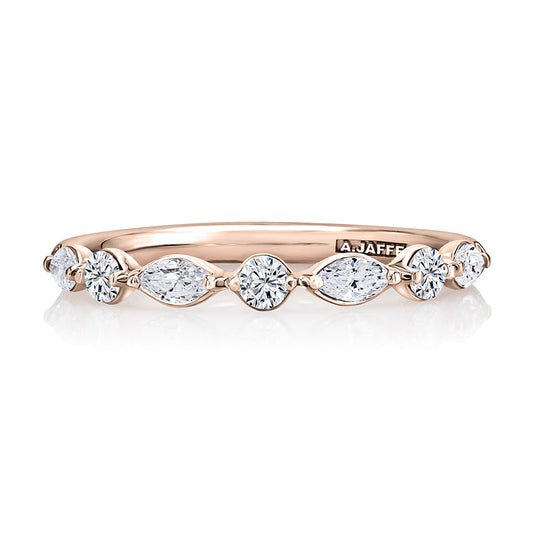 Rose gold band with marquise diamonds.