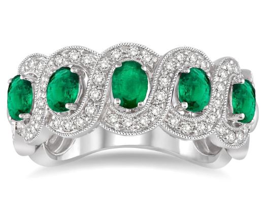Oval emerald and diamond swirl band.