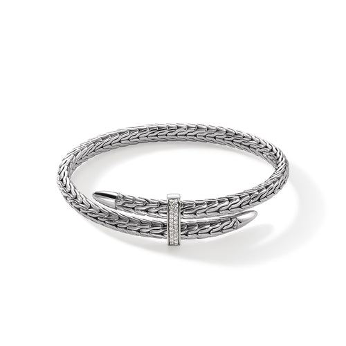 Sterling silver flexible bangle with diamonds.