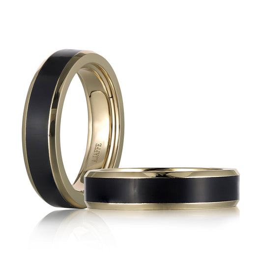 Yellow gold band with black inlay design.