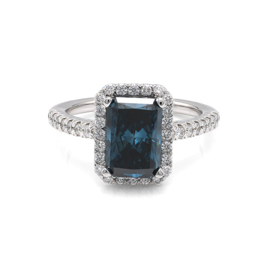 Blue radiant diamond halo engagement ring.