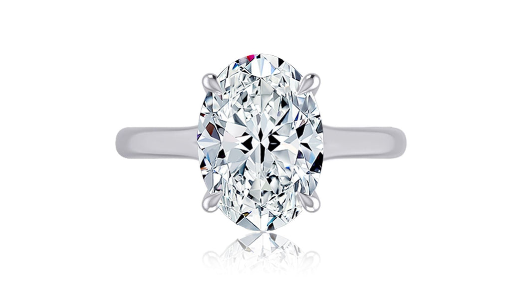 Oval diamond, white gold engagement ring.
