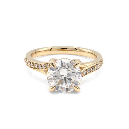 Yellow gold ring with round lab-grown diamond.