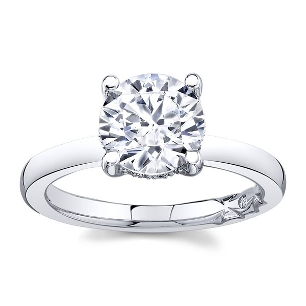 14K white gold ring with round diamonds.