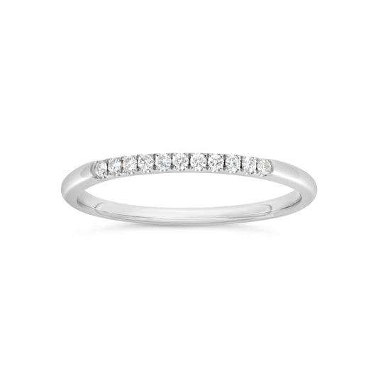 Stackable white gold band with round diamonds.