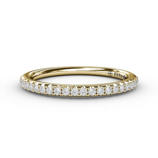 14K yellow gold band with round diamonds.
