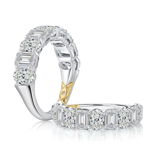 Emerald and oval diamond wedding band.