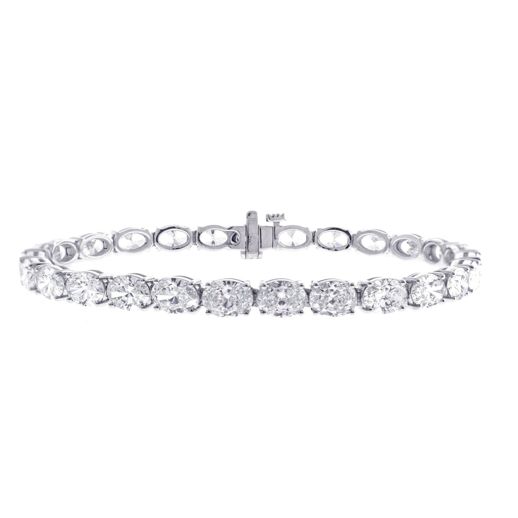 14K white gold bracelet with round diamonds.