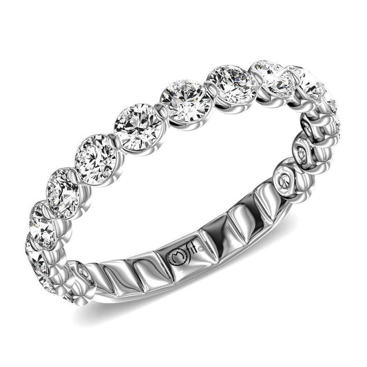 Round diamond wedding band in yellow gold.