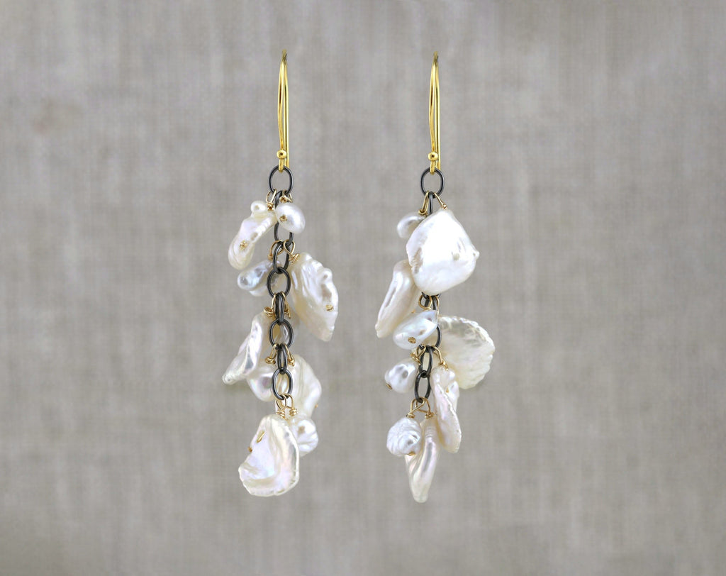 Gold-filled earrings with yellow baroque pearls.