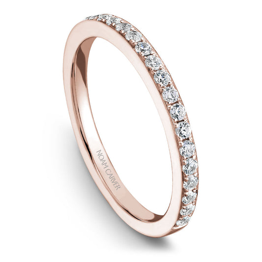 Rose gold band with round diamonds.