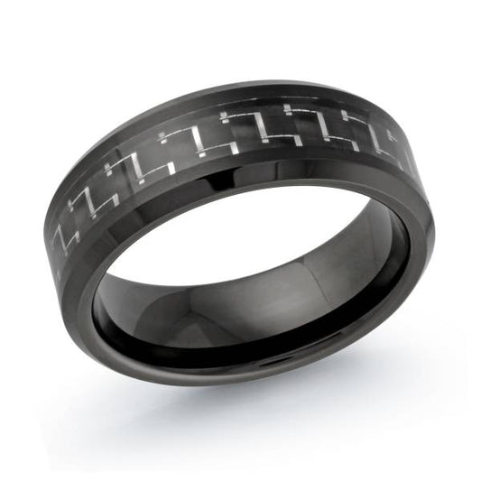 Black tungsten carbide band with carved pattern.