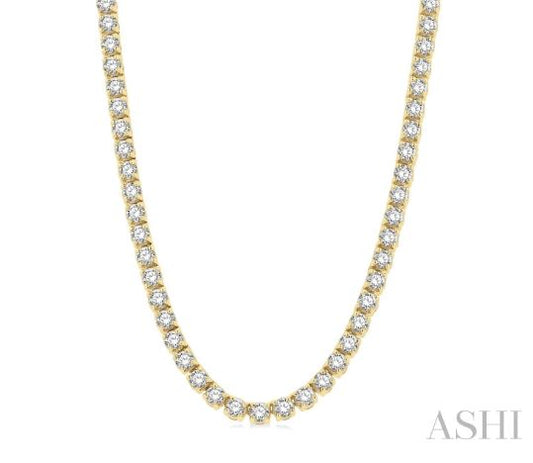 Round diamond tennis necklace, yellow gold setting.