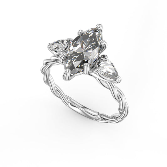 14K white gold ring, pear diamonds.