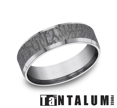 Tantalum grey carved band with textured finish.