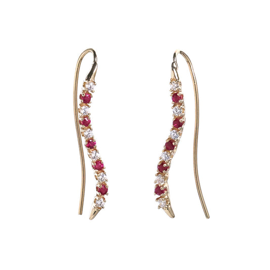 Ruby and diamond crawler earrings in gold.