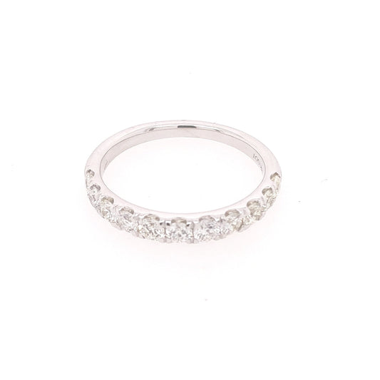 Diamond wedding band with round stones.