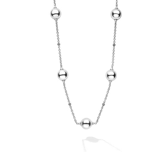 Sterling silver station necklace with beads.