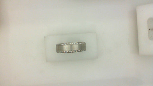 14K white gold ring with diamond edges.