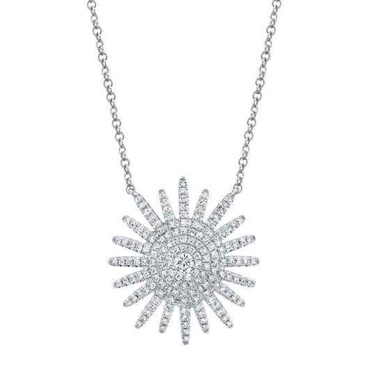 Sunburst design diamond necklace in white gold.