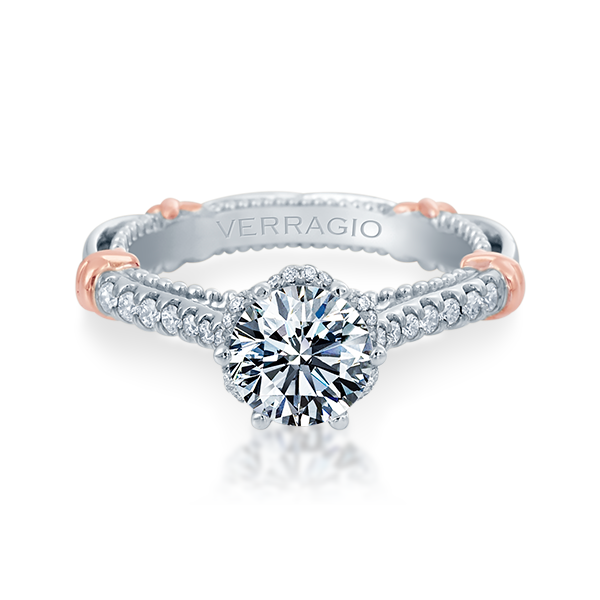 White gold diamond ring with rose gold accents.
