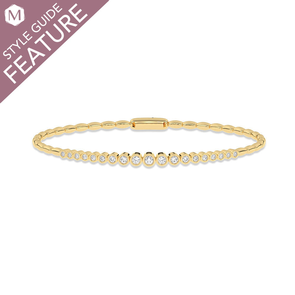Yellow gold bracelet with round diamonds.
