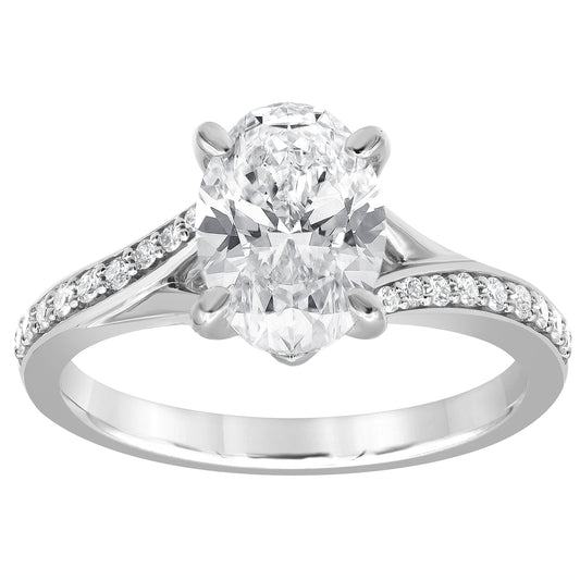Oval diamond white gold wedding ring.