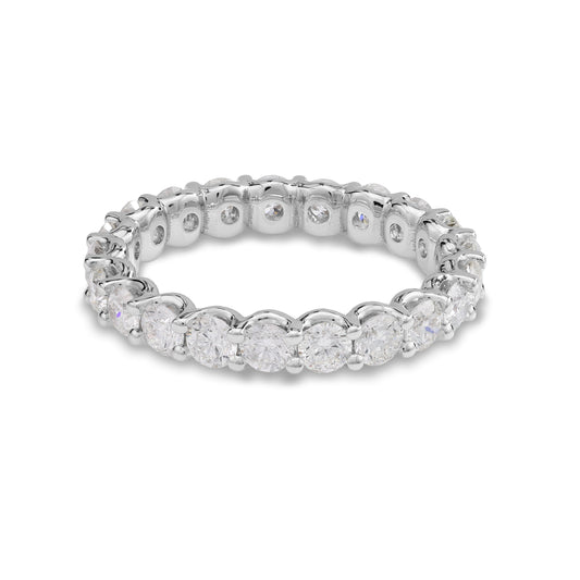 Diamond eternity band, 14K white gold.