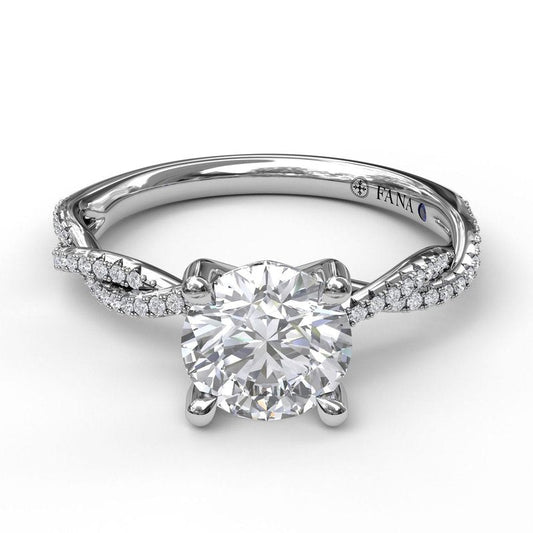 White gold ring with diamond accents and sapphire.
