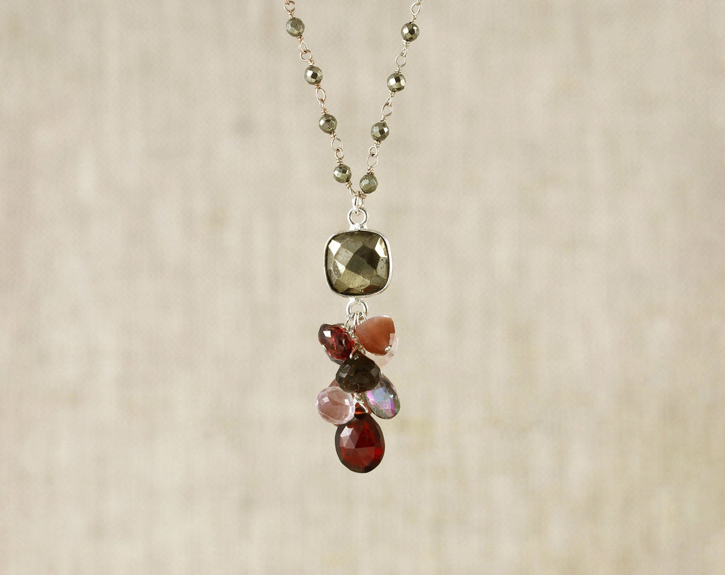 Sterling silver necklace with pyrite and gemstones.