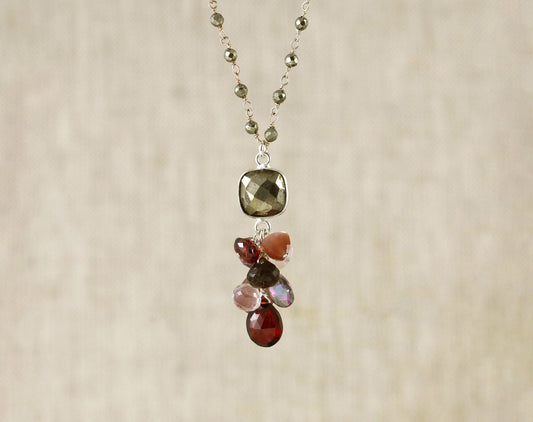 Sterling silver necklace with pyrite and gemstones.