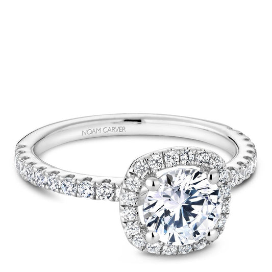 Halo diamond ring in 14K white gold.