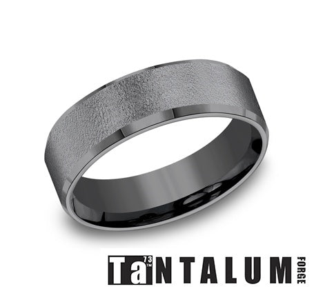 Tantalum dark grey carved band, wire brushed.