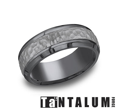 Tantalum grey carved band, hammered finish.