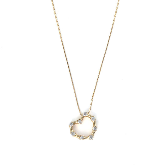 Heart-shaped yellow gold diamond necklace.