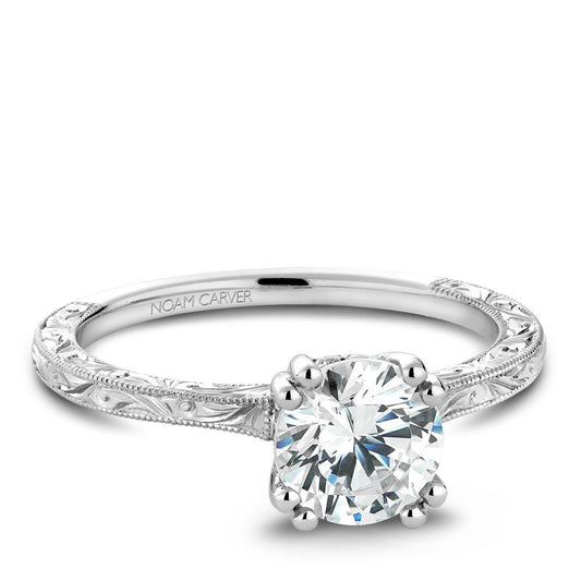 Vintage white gold ring with diamond accents.