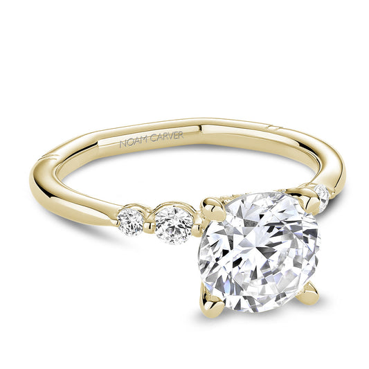 Yellow gold ring with round diamonds.