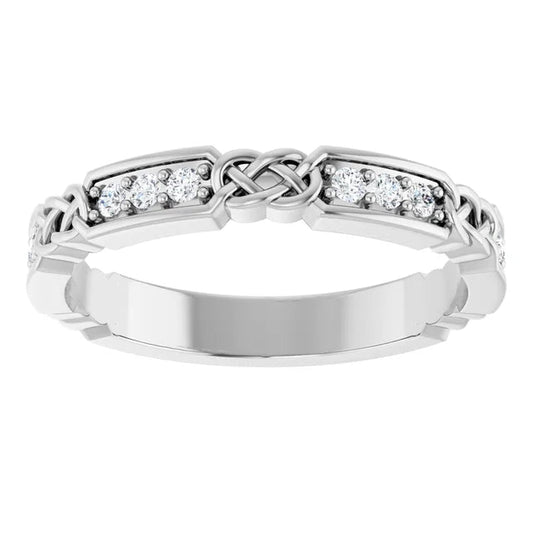 14K white gold band, round diamonds, intricate design.