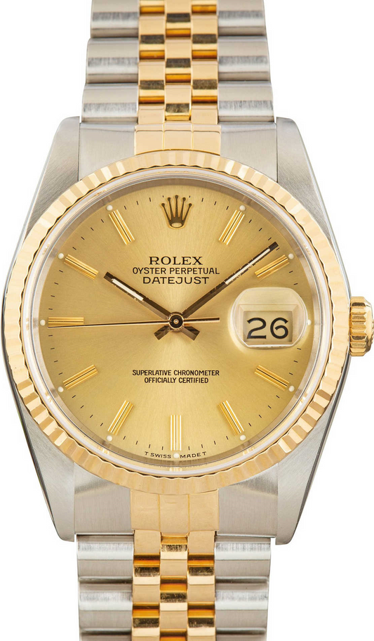 Two-tone gold and steel watch with champagne dial.