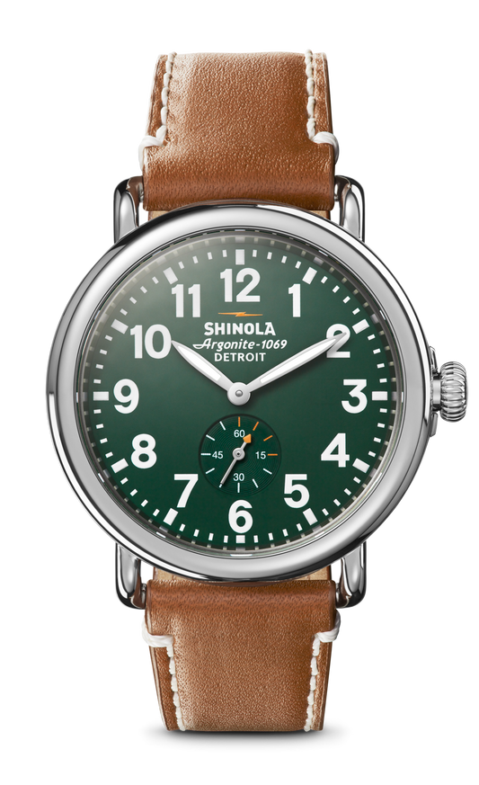 Green dial, stainless steel case, leather strap.