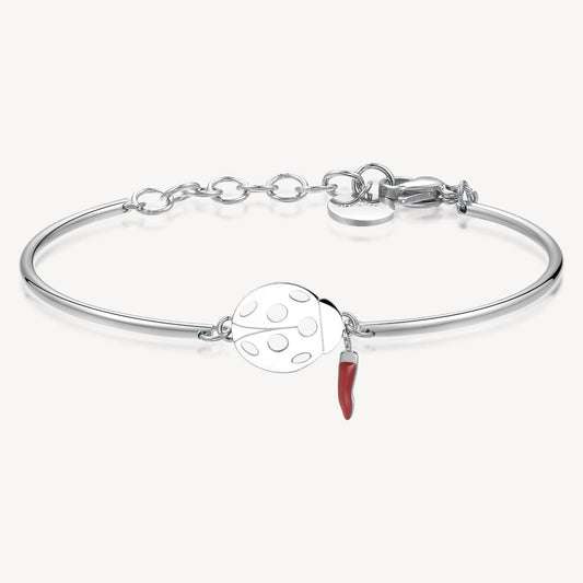 Stainless steel bangle with ladybug charm.
