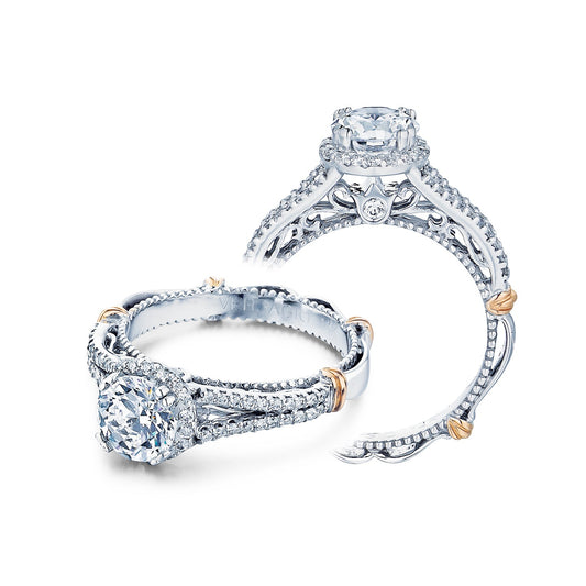18K white gold diamond halo ring.