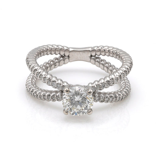 14K white gold ring with round diamond centerpiece.