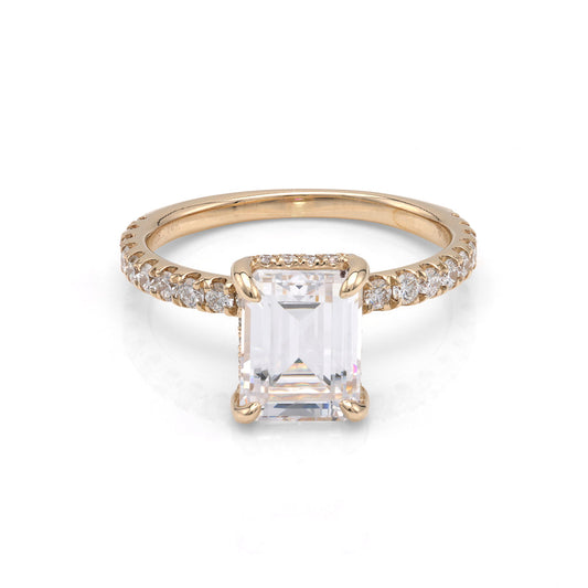 Yellow gold ring with side diamonds.