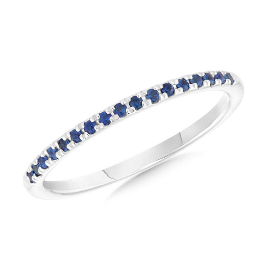 White gold band with round sapphires.