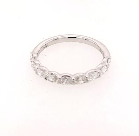 Oval diamond wedding band in white gold.
