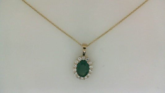 Pear emerald pendant with diamond halo.